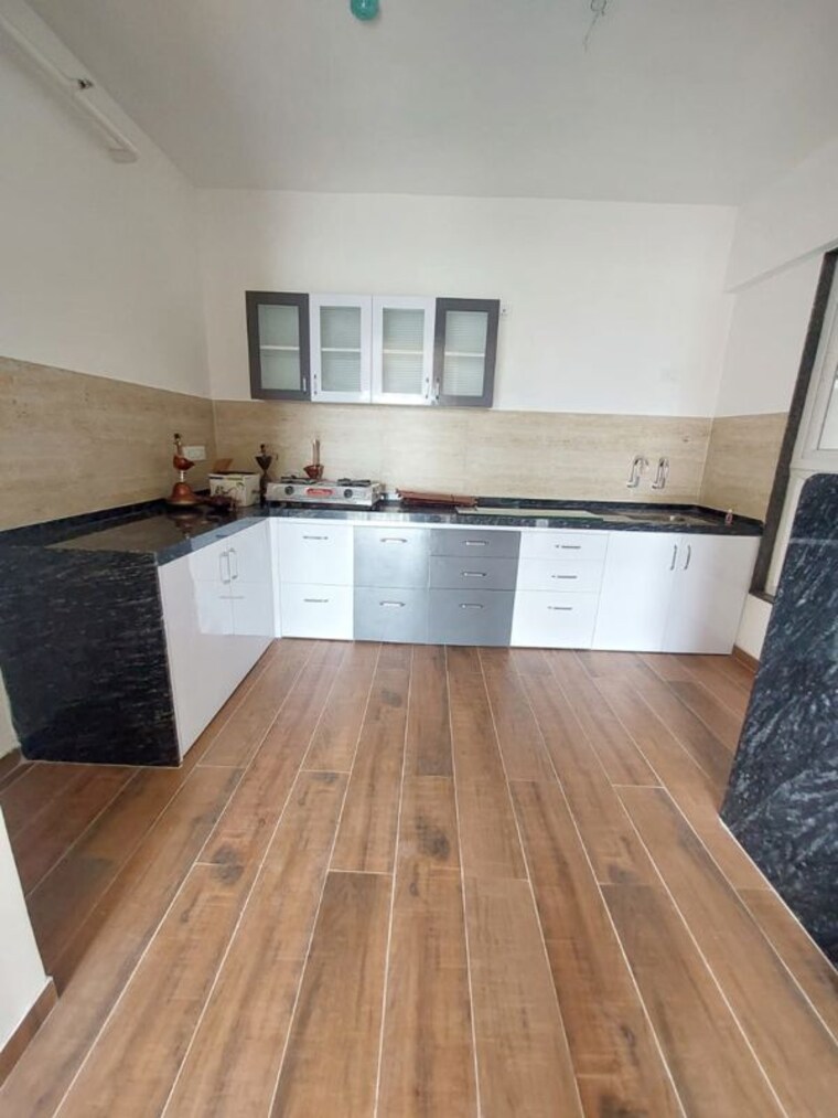 Kitchen, unique-k-town 3 Bedroom 1400 Sq.Ft. Apartment In Kiwale Pune 10631310