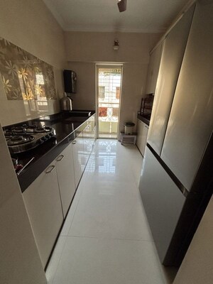 Kitchen in 2 BHK Apartment at Rustomjee Urbania, Thane West – for Sale