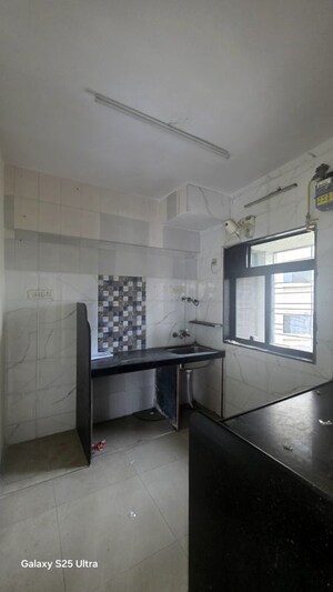 Kitchen in 1 BHK Apartment at Tulshidham Complex, Thane West – for Rent