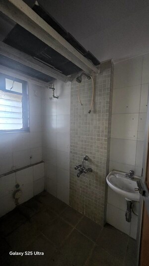Bathroom in 1 BHK Apartment at Tulshidham Complex, Thane West – for Rent