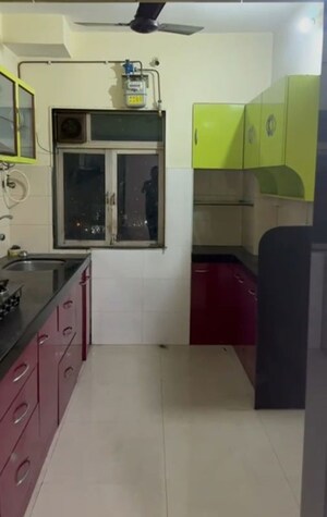 Kitchen in 2 BHK Apartment at Arjun CHS Vasant Vihar, Vasant Vihar – for Rent
