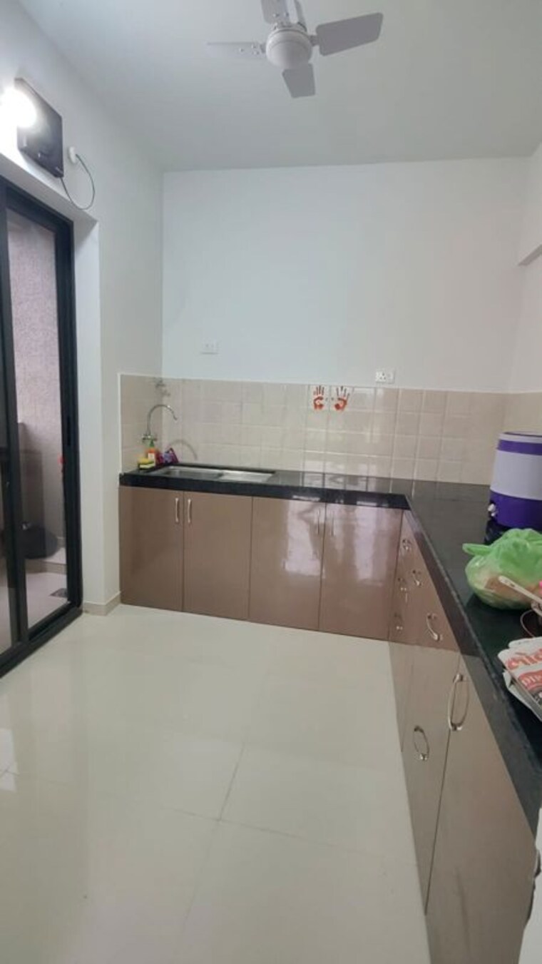 Kitchen, shapoorji-pallonji-joyville-hinjewadi 2 Bedroom 750 Sq.Ft. Apartment In Hinjewadi Pune 10631488