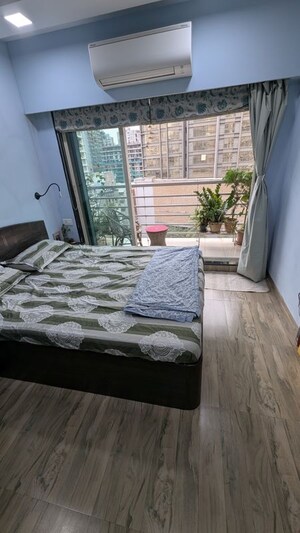 Master Bedroom in 2 BHK Apartment at NRI Complex Phase I, Seawoods Sector 58 – for Rent
