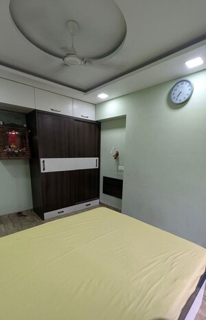Bedroom in 2 BHK Apartment at Kesar Harmony, Kharghar – for Rent