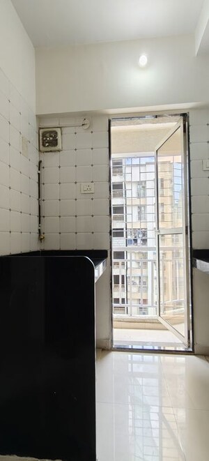 Kitchen in 1 BHK Apartment at Seven Eleven Apna Ghar II, Mira Road – for Sale