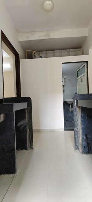 Kitchen in 1 BHK Apartment at Seven Eleven Apna Ghar II, Mira Road – for Sale