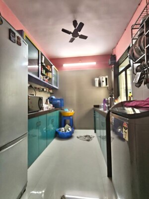 Kitchen in 2 BHK Apartment at Jay Balaji CHS, Nerul Sector 6 – for Sale