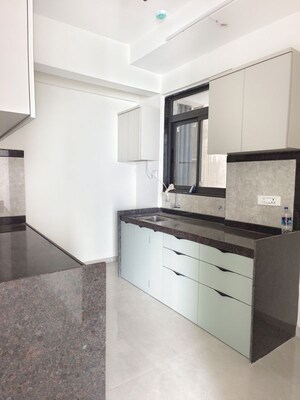 Kitchen in 3 BHK Apartment at Dhamji Shamji Mahavir Spring Tulip Phase 1, Pokhran Road No Two – for Rent