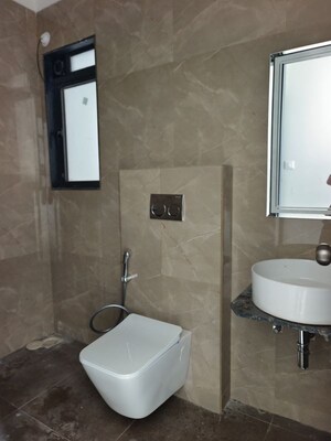 Bathroom in 3 BHK Apartment at Dhamji Shamji Mahavir Spring Tulip Phase 1, Pokhran Road No Two – for Rent