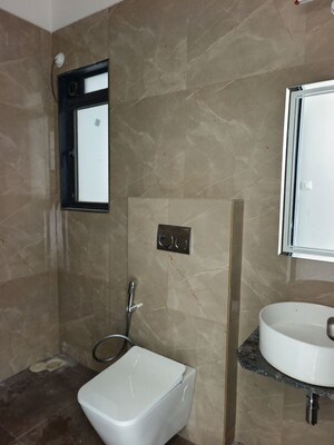 Bathroom in 3 BHK Apartment at Dhamji Shamji Mahavir Spring Tulip Phase 1, Pokhran Road No Two – for Rent