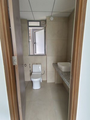 Bathroom in 4 BHK Apartment at Kalpataru Immensa, Kolshet Road – for Rent