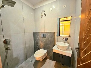 Bathroom in 3 BHK Builder Floor at Aura Homes, Patiala Road – for Rent
