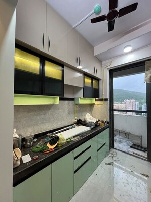 Kitchen in 2.5 BHK Apartment at Shree Satya Shankar Residency, Manpada – for Rent