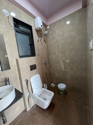 Bathroom in 2.5 BHK Apartment at Shree Satya Shankar Residency, Manpada – for Rent