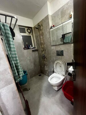 Bathroom in 2 BHK Apartment at Omkar Ananta, Goregaon East – for Rent