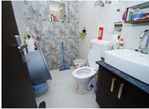 Bathroom in 3 BHK Apartment at Orris Aster Court, Sector 85 – for Sale