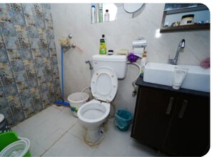 Bathroom in 3 BHK Apartment at Orris Aster Court, Sector 85 – for Sale