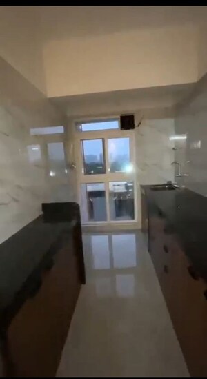 Kitchen in 2.5 BHK Apartment at Kalpana CHS Tilak Nagar, Tilak Nagar – for Sale