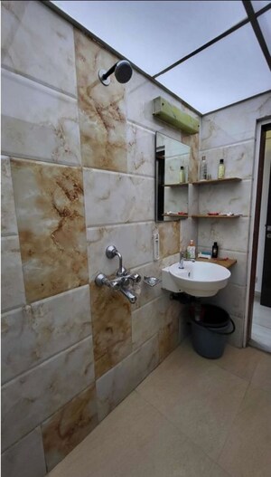 Bathroom in 3 BHK Apartment at Royal Classic Co Op Society, Andheri West – for Rent
