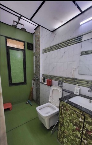 Bathroom in 3 BHK Apartment at Royal Classic Co Op Society, Andheri West – for Rent