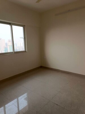 Room in 2 BHK Apartment at Omkar Signet, Malad East – for Rent
