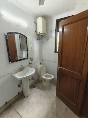 Bathroom in 2 BHK Builder Floor at Green Park – for Rent