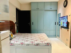 Bedroom in 2 BHK Apartment at K Raheja Heights, Malad East – for Rent