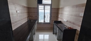 Kitchen in 2 BHK Apartment at Sheeji Bhavan, Masjid Bunder – for Rent