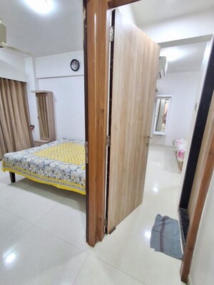 Bedroom in 2 BHK Apartment at Sunrise Tower Malad, Malad East – for Rent