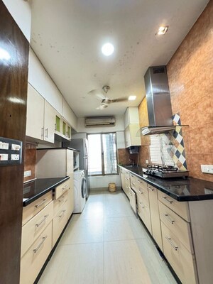 Kitchen in 2.5 BHK Apartment at Oberoi Realty Woods, Goregaon East – for Rent