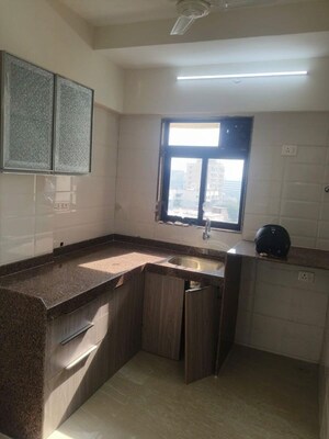 Kitchen in 1 BHK Apartment at Chandiwala Pearl Heaven, Andheri East – for Rent