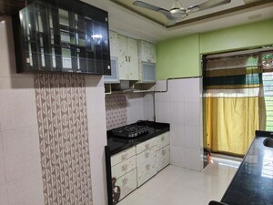 Kitchen in 2.5 BHK Apartment at Shree Satya Shankar Residency, Manpada – for Rent