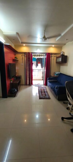 Living Room in 2 BHK Apartment at Palladium Homes, Dhanori – for Rent