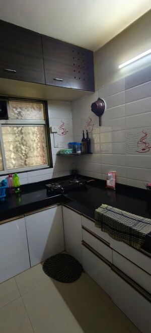 Kitchen in 2 BHK Apartment at Palladium Homes, Dhanori – for Rent