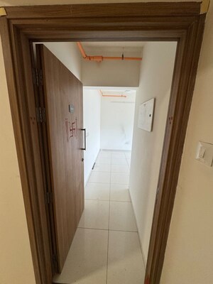 Building Lobby in 2 BHK Apartment at Godrej Upavan, Themghar – for Rent