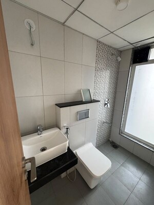 Bathroom in 2 BHK Apartment at Godrej Upavan, Themghar – for Rent