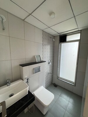 Bathroom in 2 BHK Apartment at Godrej Upavan, Themghar – for Rent