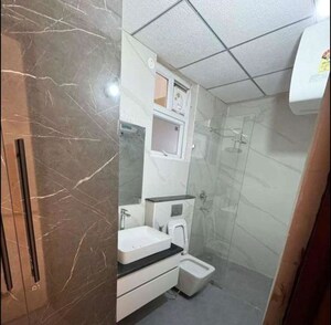 Bathroom in 3 BHK Apartment at Maya Green Lotus Utsav, International Airport Road – for Rent
