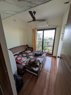 Bedroom in 2 BHK Apartment at KM Horizon Exotica, Haware City – for Rent