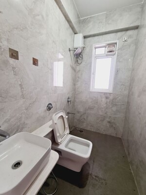 Bathroom in 1 BHK Apartment at Siddha Sky, Sion – for Rent
