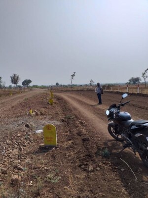 Plot Area in  Plot at Nimgaon Mhalungi – for Sale