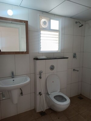 Bathroom in 2.5 BHK Apartment at Godrej Aqua, International Airport Road – for Rent