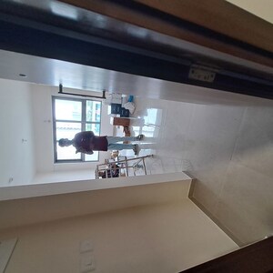 Kitchen in 2 BHK Apartment at Piramal Vaikunth, Balkum Pada – for Rent