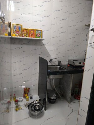 Kitchen in 1 RK Apartment at Gokuldham Complex, Goregaon East – for Sale