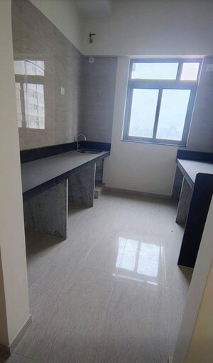 Kitchen in 3 BHK Apartment at Sheth Auris Serenity Tower 3, Malad West – for Rent