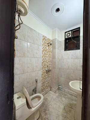 Bathroom in 1 BHK Builder Floor at Chattarpur – for Rent