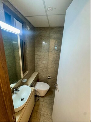 Bathroom in 2 BHK Apartment at Sheth Auris Serenity Tower 3, Malad West – for Rent
