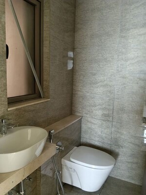 Bathroom in 2 BHK Apartment at Sheth Auris Serenity Tower 3, Malad West – for Rent