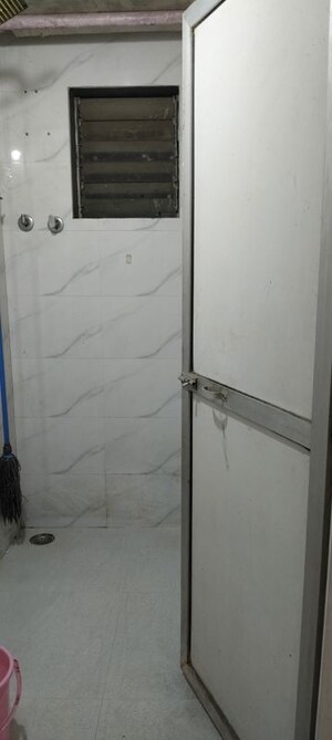 Bathroom in 1 BHK Apartment at Suryodaya Apartments, Seawoods Sector 48 – for Rent
