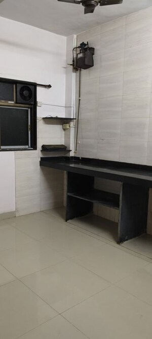 Kitchen in 1 BHK Apartment at Suryodaya Apartments, Seawoods Sector 48 – for Rent